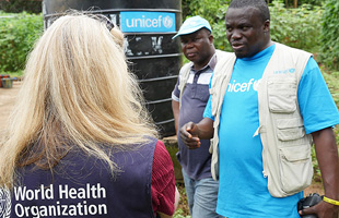 Ebola in Sierra Leone: UNICEF provides water and hygiene kits to every home in the quarantined village.