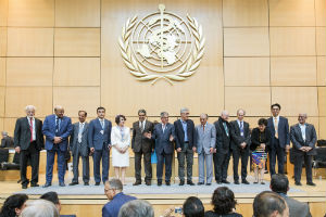 Award winners and representatives of the foundations presenting awards are applauded by delegates of the Sixty-ninth World Health Assembly.